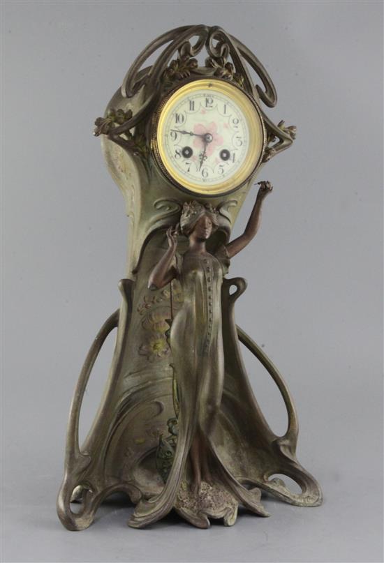 C. Bonnefond. A French Art Nouveau bronzed spelter mantel clock 18.5in.